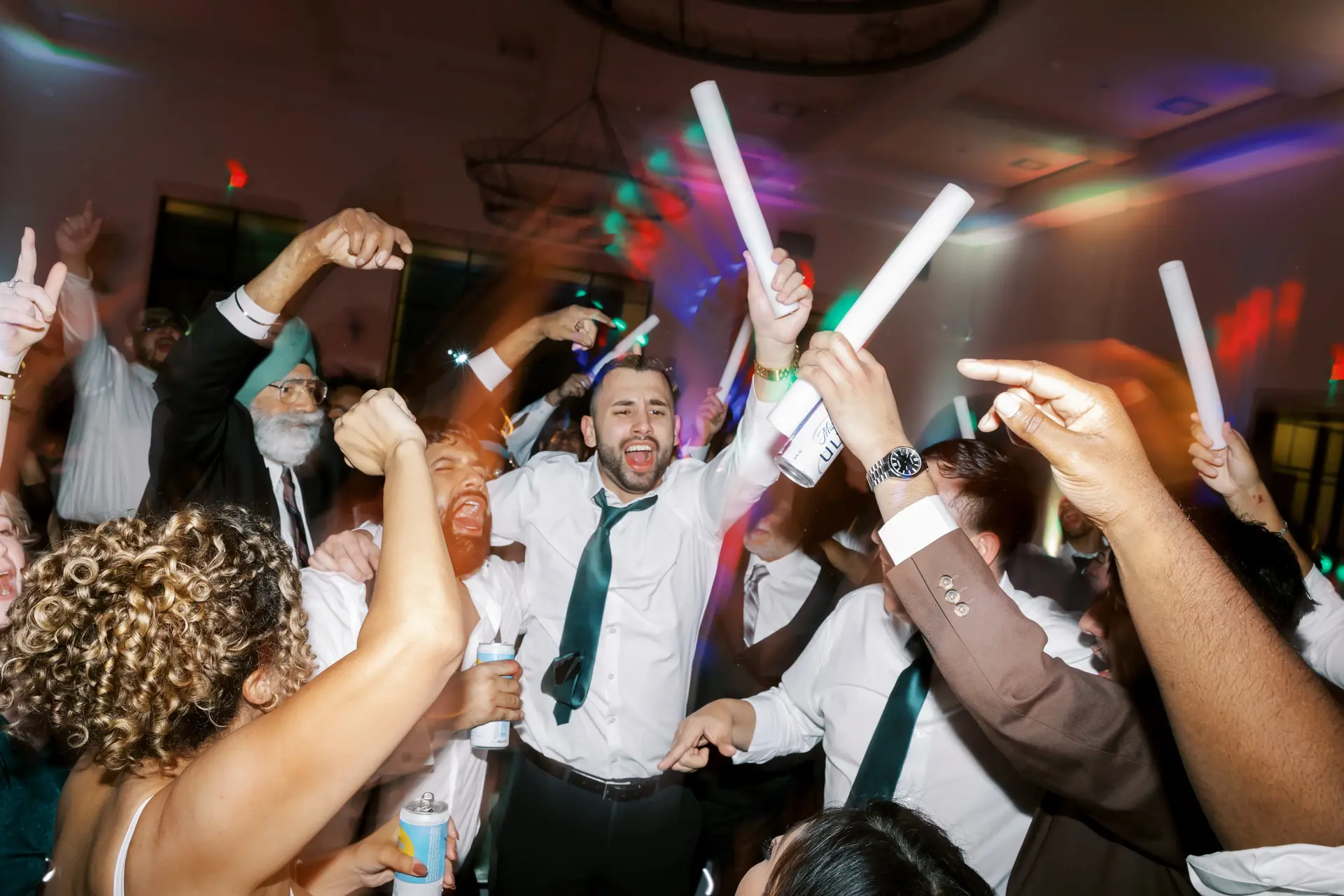 DJ Lakha lighting a packed wedding dancefloor